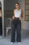 High Waisted Wide Fit Washed Denim in Black. Scarlette The Label, an online fashion boutique for women.